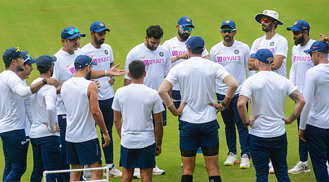 Indian coach Ravi Shastri interacts with team players during a practice session ahead of the first cricket test match against South Africa at Dr Y S Rajasekhara Reddy Stadium in Visakhapatnam Monday Sept. 30 2019. | (Photo | PTI)