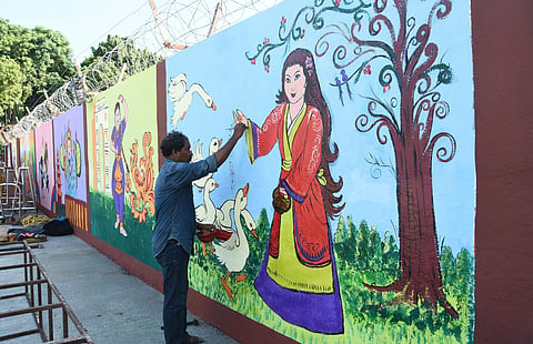Preparations are in full swing to welcome Chinese President Xi Jinping at Chennai Airport. Paintings depicting Chinese and Indian history been depicted in the airport walls in welcoming the president. | (Ashwin Prasath | EPS)