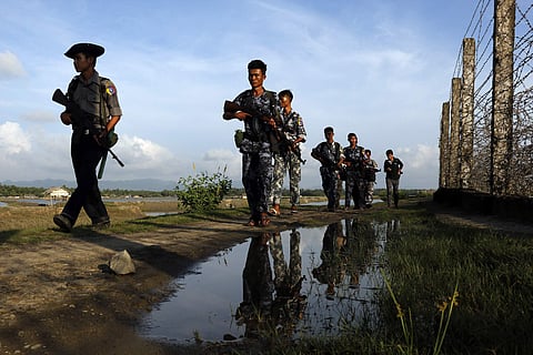 Myanmar police officers patrol along the border fence. Image used for representational purpose.