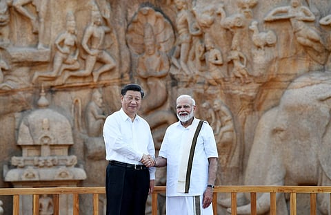 The Prime Minister Shri Narendra Modi and the President of the People s Republic of China Mr. Xi Jinping at Arjuna s Penance in Mamallapuram Tamil Nadu on October 11 2019. (Photo | Special Arrangements)