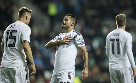 Germany's İlkay Gundogan, centre, celebrates after scoring. (Photo | AP)