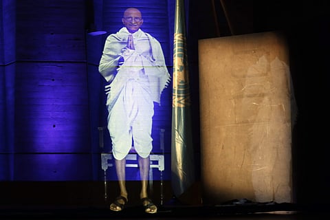 A hologram of Indian leader Mahatma Gandhi speaks to the audience during a conference on the future of education, at the UNESCO headquarters, in Paris. ( Photo | AP )