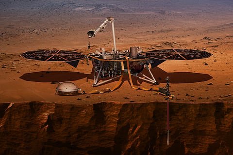 This illustration made available by NASA in 2018 shows the InSight lander drilling into Mars. (NASA)