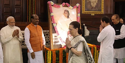 Prime Minister Narendra Modi, Congress interim president Sonia Gandhi, Rahul Gandhi and Lok Sabha Speaker Om Birla paying tribute to Mahatma Gandhi on 150th birth Anniversary at Parliament house in New Delhi on Wednesday. | (Photo | Shekhar Yadav / EPS)