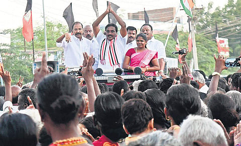 Flanked by ministers, AIADMK Nanguneri candidate V Narayanan campaigning on Friday | Express