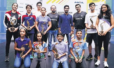 Winners in various age groups of the HCL-sub junior and junior national squash meet