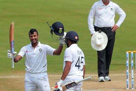 India's Mayank Agarwal, left, celebrates after scoring hundred runs. (Photo | AP)
