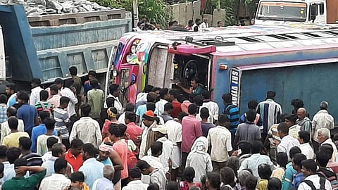The bus which was overturned at Jetti Agrahara village near Koratagere on Wednesday