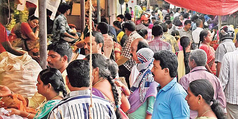People buy vegetables at Swaraj Maidan Rythu Bazaar in city (Photo | P Ravindra Babu, EPS)
