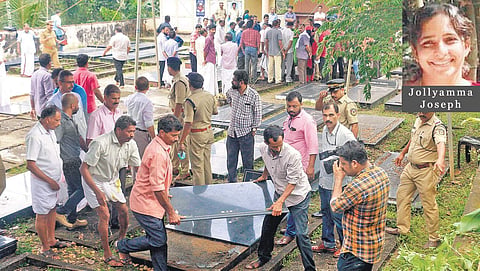 Police exhuming bodies of the family members who died under mysterious circumstance, from their graves at Koodathayi. (Photo | EPS)