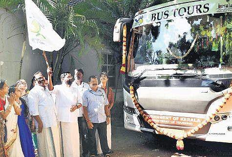 Tourism Minister Kadakampally Surendran flagging off the ‘Conducted Tour’ facility on Friday Vincent Pulickal