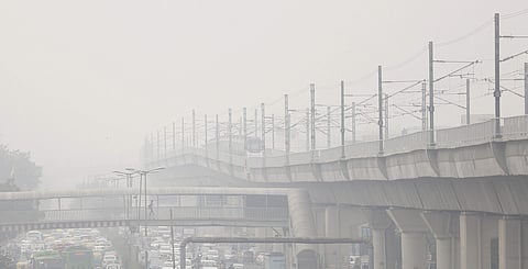 Commuter drive-through heavy smog in New Delhi. (Photo | EPS/Arun Kumar)