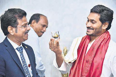 ONGC ED AJ Morbale interacts with CM YS Jagan Mohan Reddy at his camp office in Tadepalli on Thursday | Express