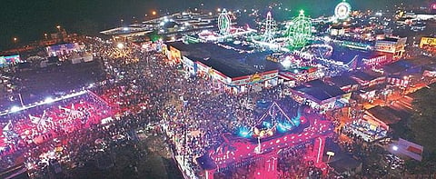 Aerial view of the illuminated Baliyatra trade fair on the banks of river Mahanadi in Cuttack on Friday | Express