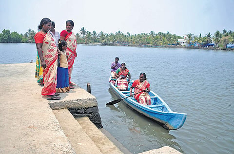 Residents of Valanthakad await their turn for the country boat which is one of the modes of transport available to the islanders | A Sanesh