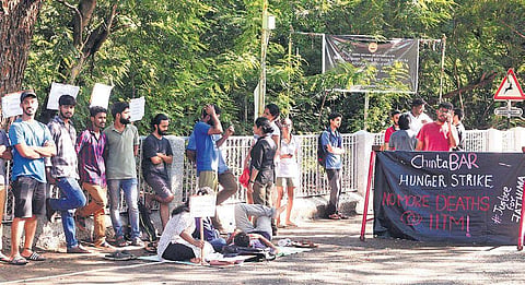 Azhar and Justin, students from Humanities and Social Science department of IIT-M sit on hunger strike demanding internal probe into 19 year old Fathima Latheef case, who committed suicide, at IIT-M in Chennai on Monday | DEBADATTA MALLLICK