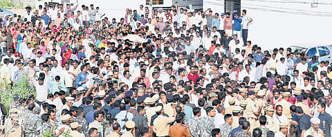 Tension prevailed in Karimnagar after police diverted the funeral procession of driver Babu towards the cremation ground. RTC workers demanded that his body be kept at the Karimnagar bus depot