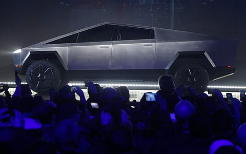 Tesla CEO Elon Musk introduces the Cybertruck at Tesla's design studio on Thursday. (Photo | AP)