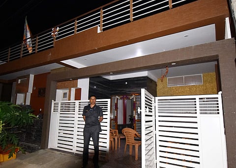 Security at the residence of BJP worker Giridhar in Mysuru. (Photo | Udayshankar S, EPS)