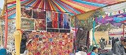 The mela is an occasion for the people of the basti to enjoy themselves