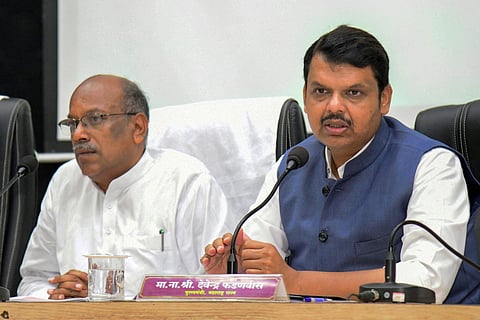 Chief Minister Devendra Fadnavis addresses during a review meeting after interacting with farmers and inspecting crop damages due to unseasonal rains in Akola Sunday. (Photo | PTI)
