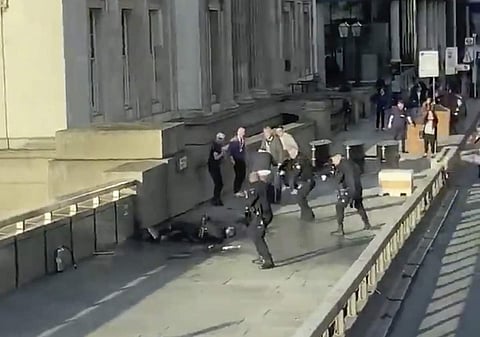A man wearing a fake explosive vest stabbed several people before being tackled by members of the public and then shot dead by armed officers on London Bridge, police and the city’s mayor say. (Photo | AP)
