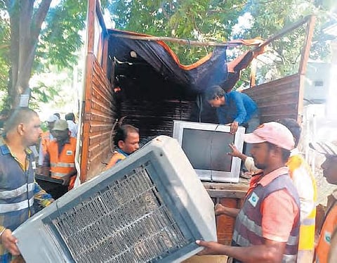 GHMC officials collect scrap from households in the city on Sunday