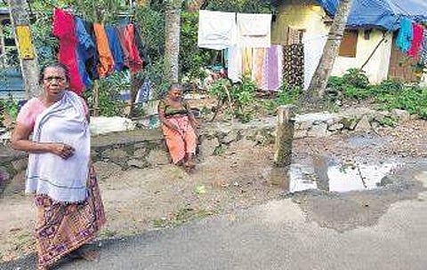 Shyamala and Jaya, residents of Pullukadu settlement colony in Kulathoor near the street tap | EXPRESS