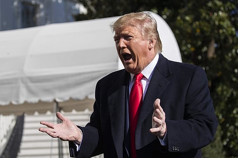 US Donald Trump speaks to reporters upon arrival at the White House in Washington. (Photo|AP)