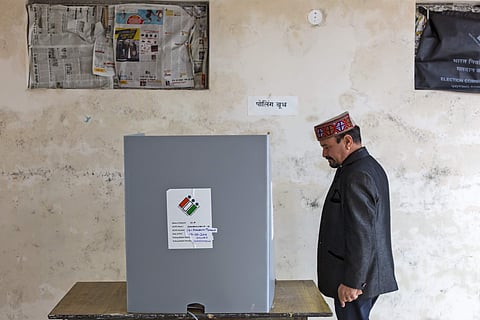 A voter walks to a polling enclosure to cast his ballot (Photo | AP) | (Image for representation)