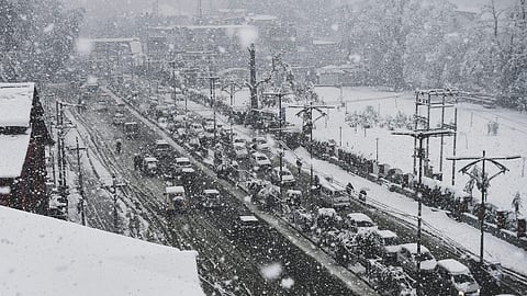 The Jammu-Srinagar highway was on Sunday reopened for vehicular traffic after a day-long closure due to heavy snowfall,