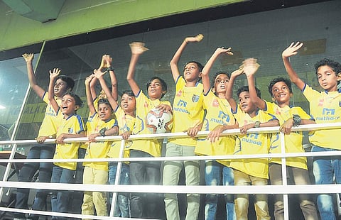 The kids watching the Kerala Blasters’ match against Odisha FC in Jawaharlal Nehru Stadium, Kochi, on Friday. They were the special guests of the match | A Sanesh