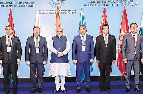 Amit Shah with the HoDs of SCO Member States dealing with disasters. | (Photo | PTI)