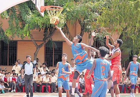 The St Joseph’s basketball team in action against their opponents at the 23rd Fr Ephrem Trophy match on Friday Vincent Pulickal