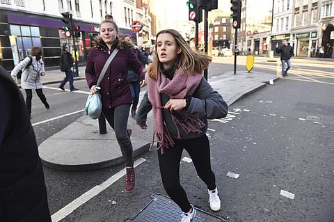 People are evacuated from London Bridge. (Photo | AP)