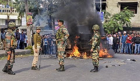Army personnel attempt to control protestors during an agitation against the passing of Citizenship Amendment Bill (CAB) in Tezpur Thursday Dec. 12 2019. (Photo | PTI)