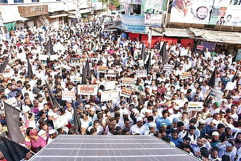 Activists protest at Muslim Chowk in Kalaburagi on Friday | express