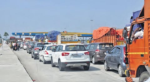 Vehicles that didn’t have FASTags were stuck in long lines at toll plazas on Sunday. A scene from Panthangi on the Hyderabad-Vijayawada National Highway