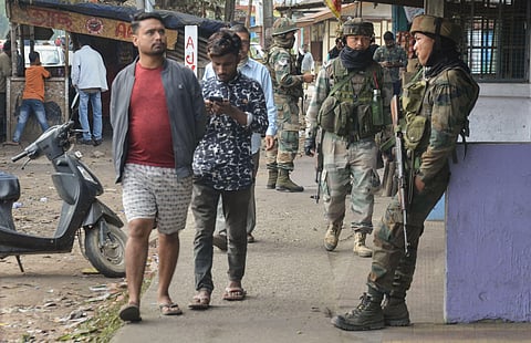 Army personnel guard in a market at Chauba which witnessed several an Anti-Citizenship Amendment Act protests in Dibrugarh district of Assam Tuesday. (Photo | PTI)