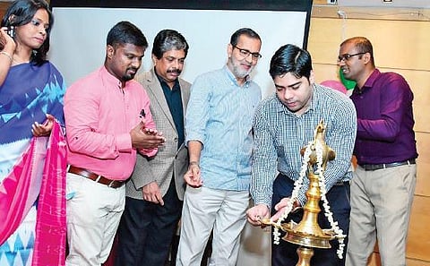 District collector S Suhas inaugurating the 3rd annual meet of People Leaders - Kerala Form by lighting the lamp