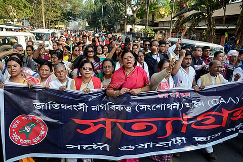 Activists of All Assam Students Union AASU along with members of different organizations during the 2nd day of their 'Satyagraha' protest demanding withdrawal of the Citizenship Amendment Act 2019 CAA in Guwahati Tuesday Dec. 17 2019. (Photo | PTI)