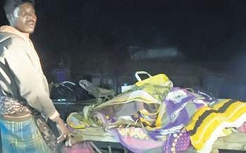 The incident came to light after a video of the man, identified as Khela Soren of Sanajunupala village within Kaptipada police limits, pulling the trolley with his wife’s body on it went viral on social media on Tuesday. (Photo | EPS)