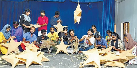 Students of Al Ameen College, Aluva, making Christmas stars