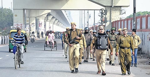 Police personnel patrol Seelampur, a day after protests against the CAA turned violent, on Wednesday. (Photo | EPS, Parveen Negi)
