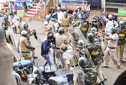 Police personnel lathi-charge at protestors during a demonstration against the Citizenship Amendment Act (CAA), in Mangaluru, Thursday, Dec. 19, 2019. (Photo | PTI)