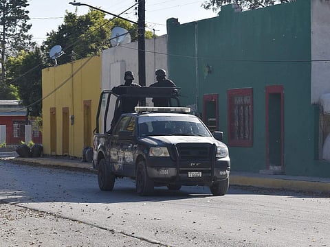 Police patrol VIlla Union, Mexico, Sunday, Dec. 1, 2019, the day after it was assaulted by gunmen. (Photo | AP)