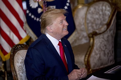 President Donald Trump speaks during a Christmas Eve video teleconference with members of the military at his Mar-a-Lago estate in Palm Beach, Fla. (Photo | AP)