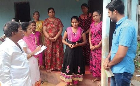 District officials meet Harish Bangera’s family members, in Beejady on Tuesday | Express
