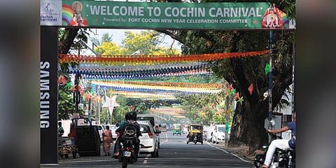 The banner put up by the Cochin Carnival Committee. (Below) The rides at Veli Ground as part of the festivities. (Photo | A Sanesh, EPS)