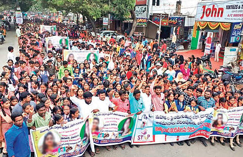 Private school students take out a rally at Suryapeta on Monday protesting against Hyd vet rape and murder case.